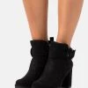 Marco Tozzi BY GUIDO MARIA KRETSCHMER Boots à Talons Black Femme